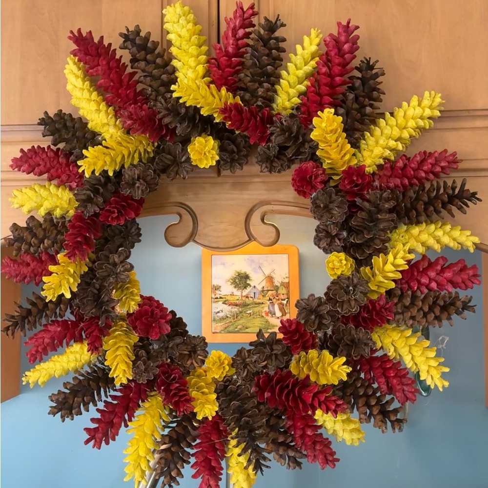Vibrant Holiday Wreath with Red and Yellow Accents